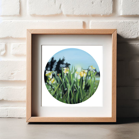 Spring daffodil flowers in a blurry bokeh style framed in a wooden frame leaning against a painted brick wall, this fine art print is fresh and yellow with green. Painted in a blurry bokeh style by New Zealand bokeh artist Mel McKenzie, The Penny Drops.