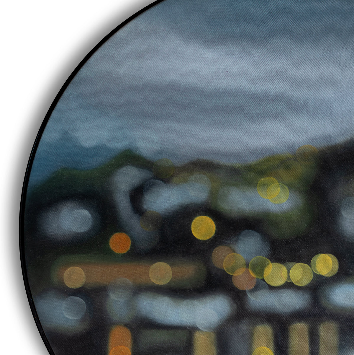 Wanaka, New Zealand, lakefront water reflections. Painting on round canvas framed in black circular frame. Painted in oils in a blurry bokeh style by New Zealand artist Mel McKenzie, The Penny Drops.