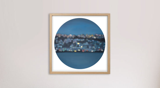 small blue round artwork, sparkling water city lights