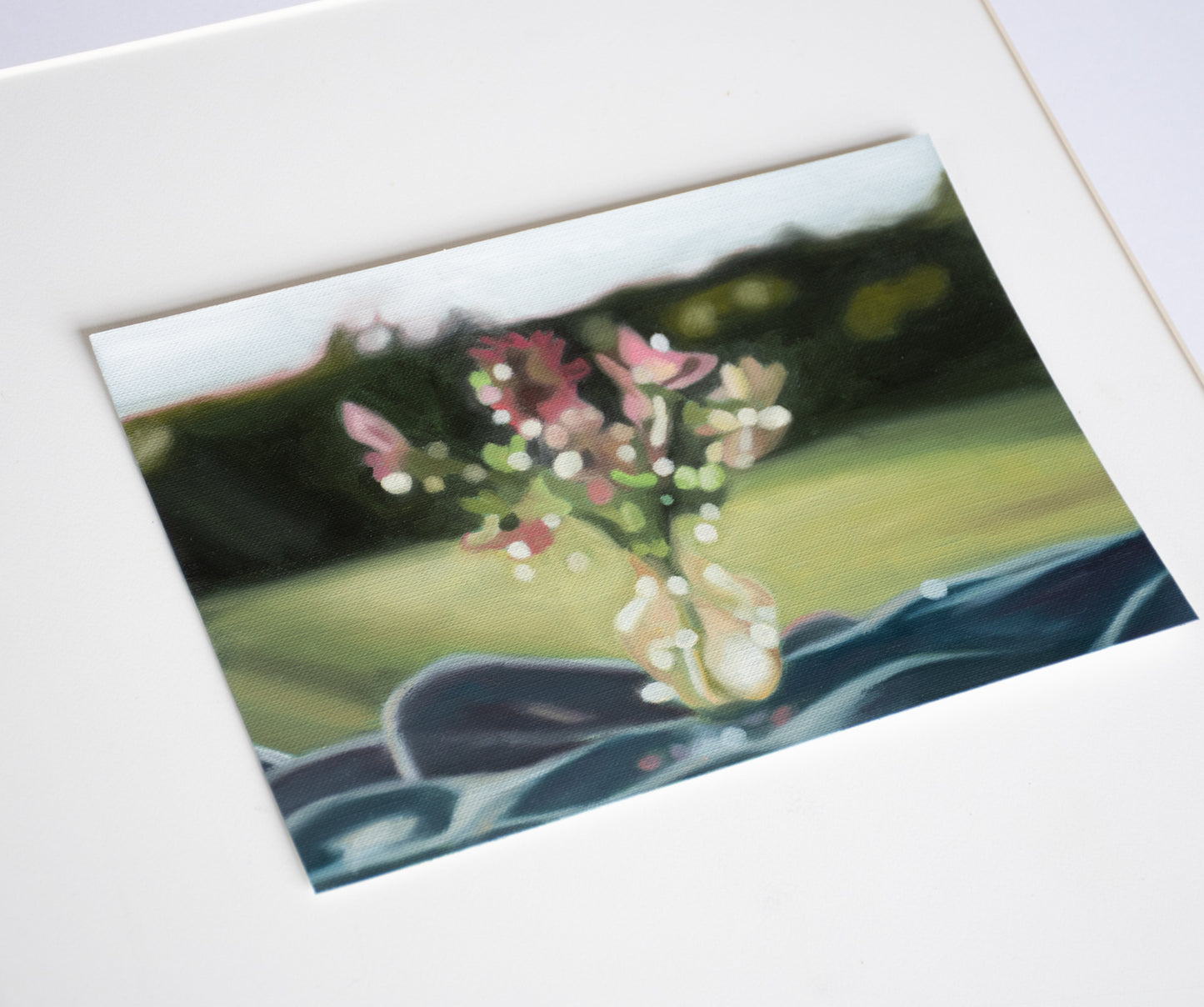 Painting of a floral arrangement in a vase; oil on card