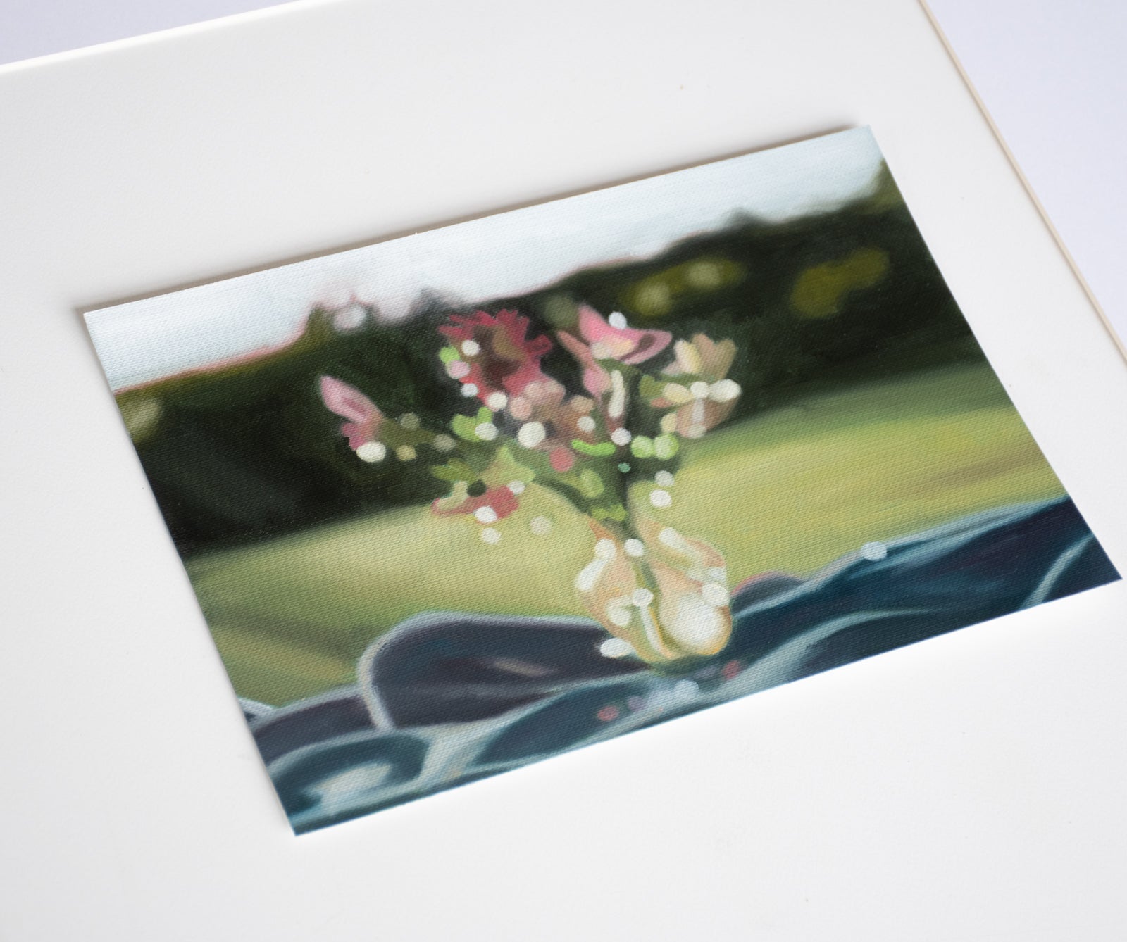 Painting of a floral arrangement in a vase; oil on card
