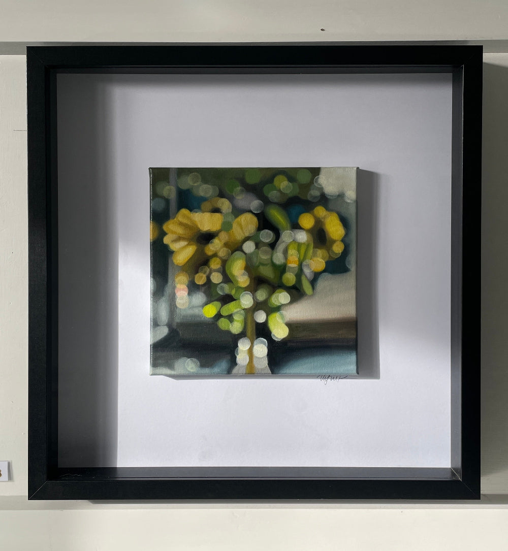 Framed oil painting of sunflowers in a vase - painted in a blurry, bokeh style by New Zealand artist, Mel McKenzie