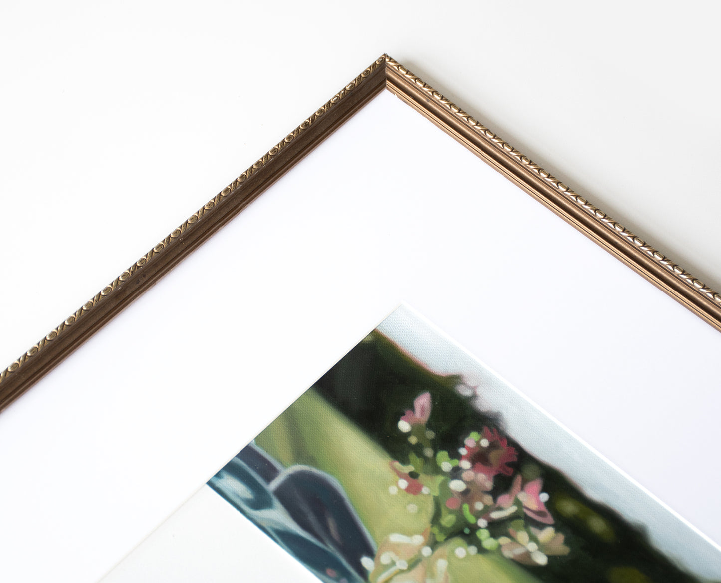 Framing artwork with a floral design on a white background