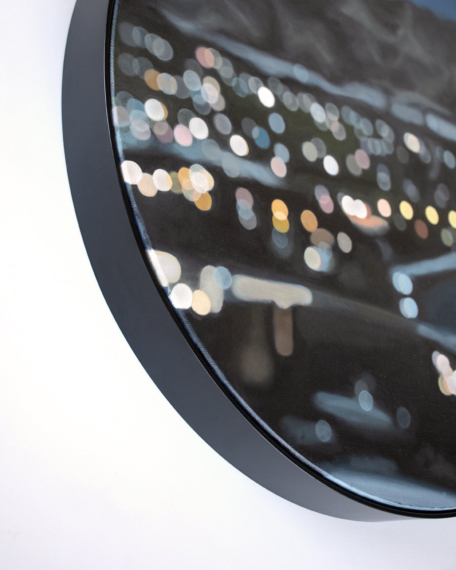 Framed art on a round canvas, 
Wanaka New Zealand oil painting in a blurry bokeh style by bokeh artist Mel McKenzie, The Penny Drops