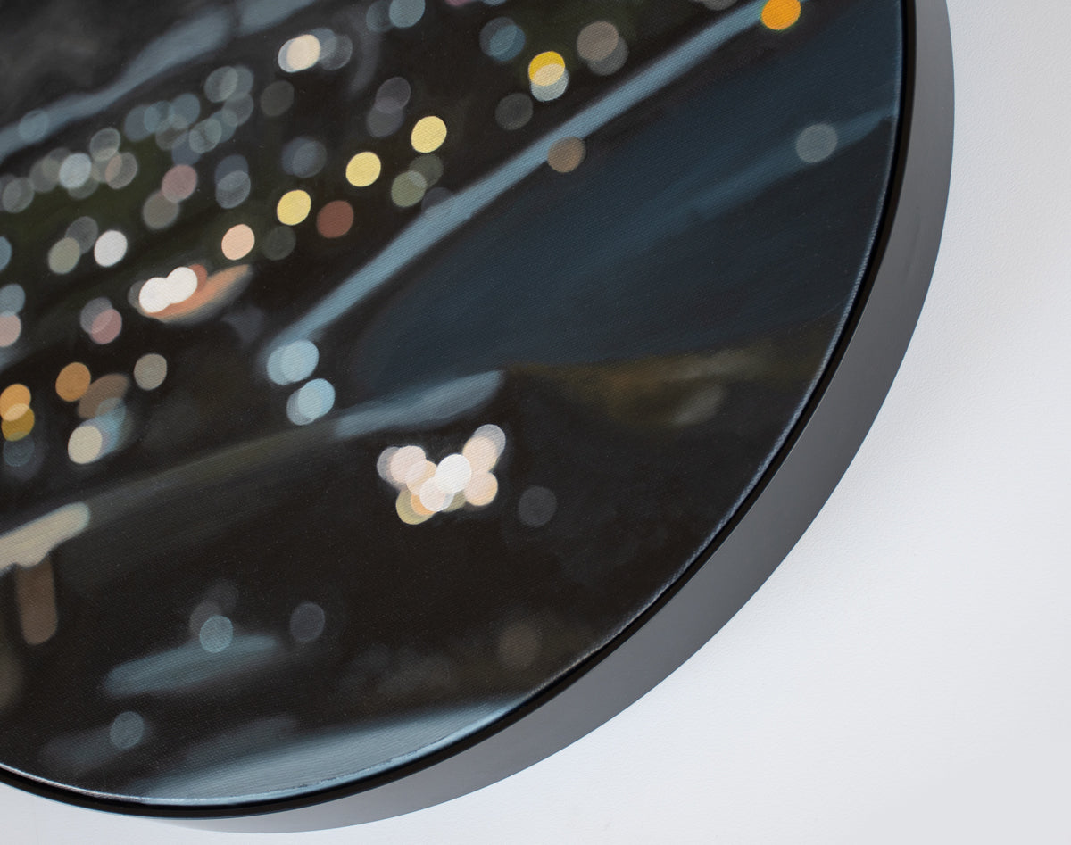Framed in black, art on a round canvas, 
Wanaka New Zealand oil painting in a blurry bokeh style by bokeh artist Mel McKenzie, The Penny Drops