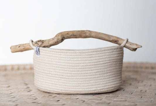 Oval caddy basket with driftwood handle