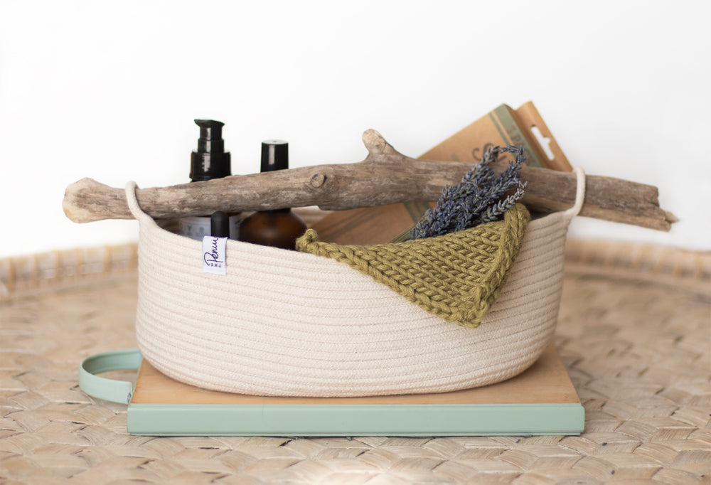 Large coiled rope basket with driftwood handle