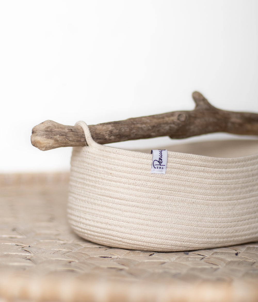 Large coiled rope basket with driftwood handle