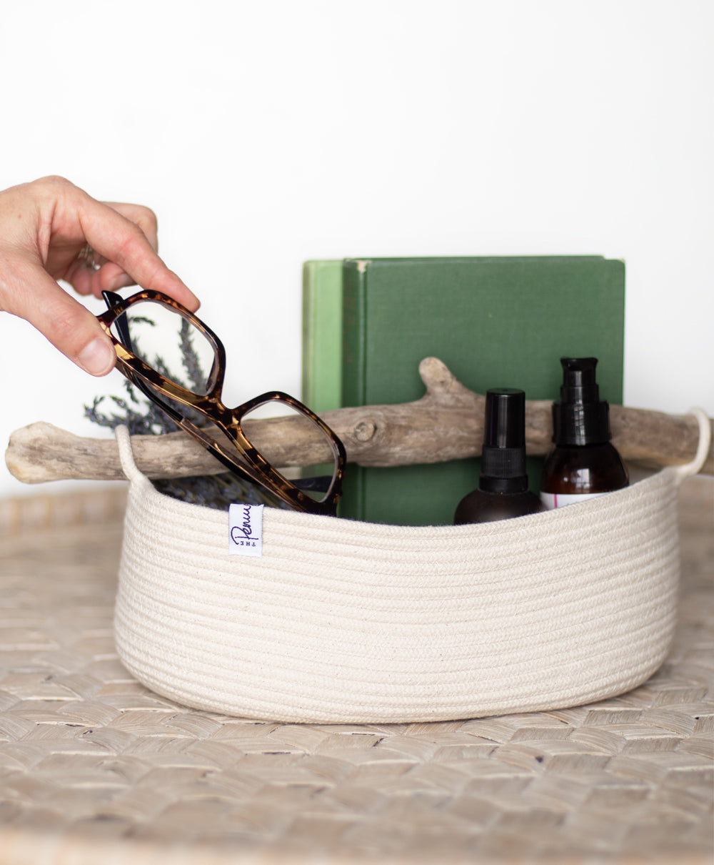 Large coiled rope basket with driftwood handle